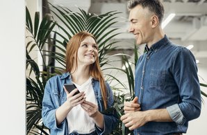smiley-coworkers-looking-each-other