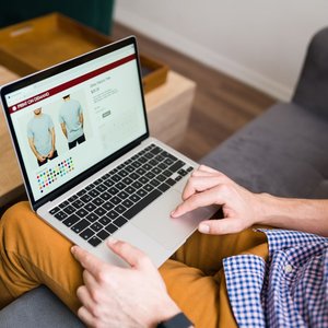 young-man-buying-clothes-online